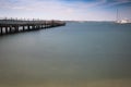 PortoroÃÆÃ¢â¬Â¦ÃâÃÂ¾, Slovenia - May 26, 2019 - people relaxing on wooden footbridge pier in PortoroÃÆÃ¢â¬Â¦ÃâÃÂ¾ on adriatic coastline Royalty Free Stock Photo